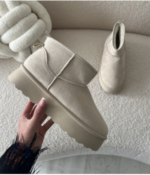 Beige high mules with fur